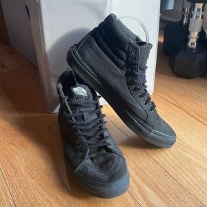 Vans all black high tops